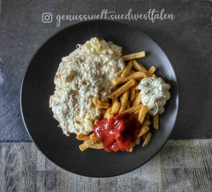 " Überbackenes Kalbsschnitzel / Pommes "